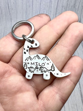 Load image into Gallery viewer, Dino Scene • Personalised Name tag, ID Tag, Dog tag, Cat tag, Custom keyring, Silver Aluminium, Brass or Copper • Dinosaur, Mountain, tree, birds